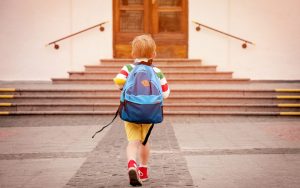 Child Walking into School