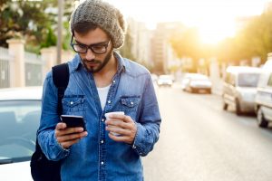 Man on Phone with Coffee