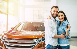 Couple with new car