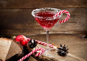 christmas cocktails holiday cocktail red martini with candy cane