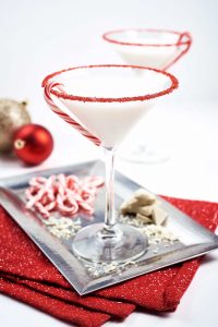 peppermind winter wonderland christmas holiday cocktail in maritini glass
