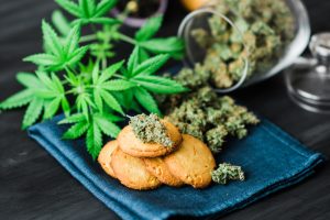 cannabis cookies and leaves on tray, cannabis advertising
