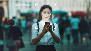 woman identity anonymous holding cellphone future of cookies and privacy google contextual solutions just global bidtellect