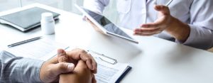 Doctor,Consulting,With,Patient,And,Checking,Sickness,Condition,While,Presenting