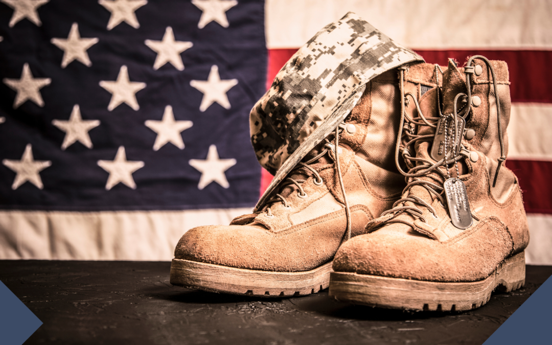 image of military boots over american flag for veterans day advertising deals and discounts