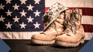 image of military boots over american flag for veterans day advertising deals and discounts