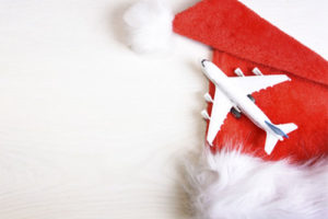 Airplane on top of Santa's Hat