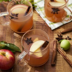 photo of hot cider for non alcoholic holiday mocktails